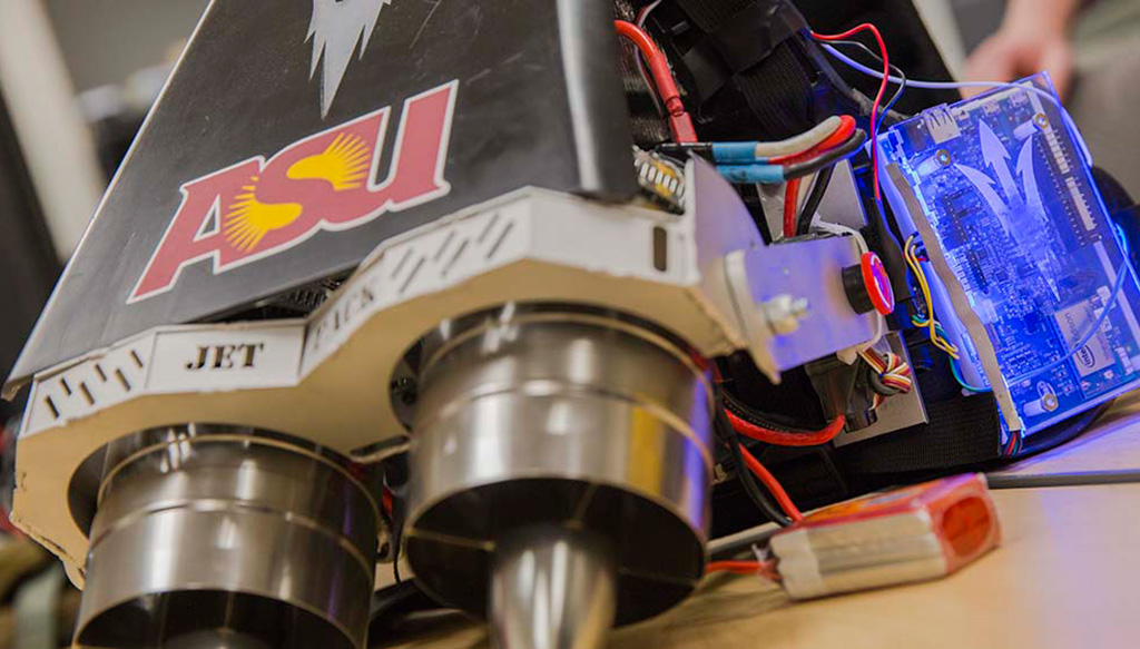 A device that says "Jet Pack" on it with wires, circuits and small turbines on the end of it with an ASU logo